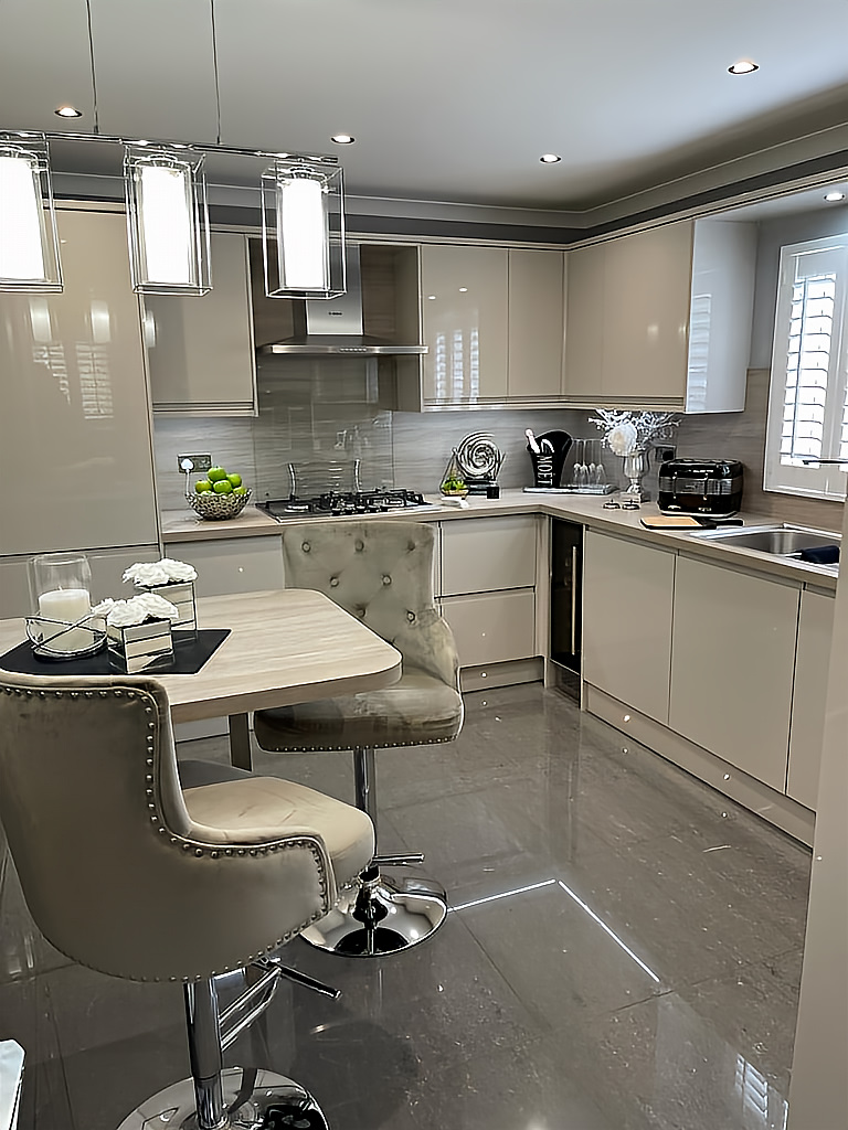 Sleek cashmere handleless kitchen fitting project