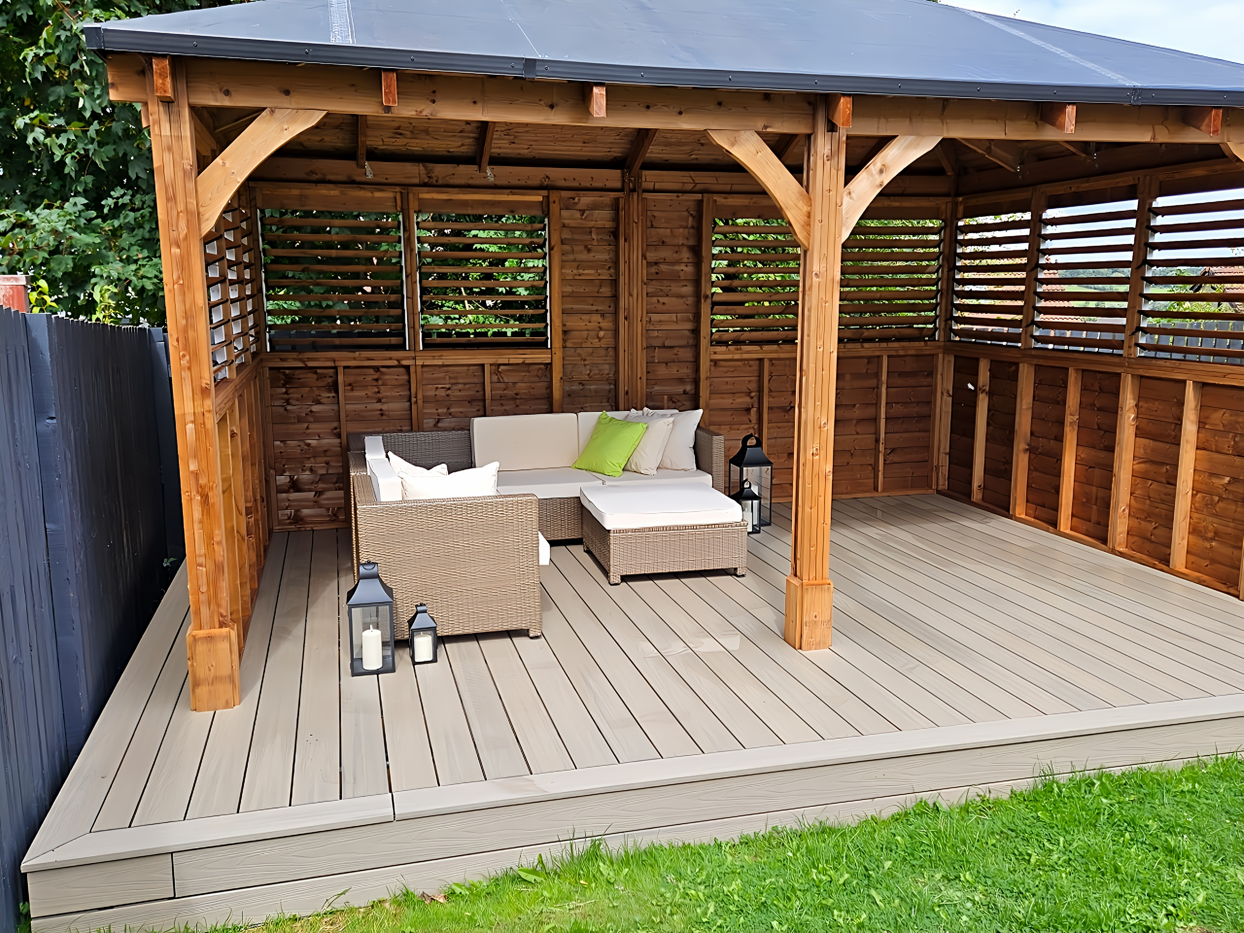 Composite decking integrated with bespoke garden gazebo structural frame
