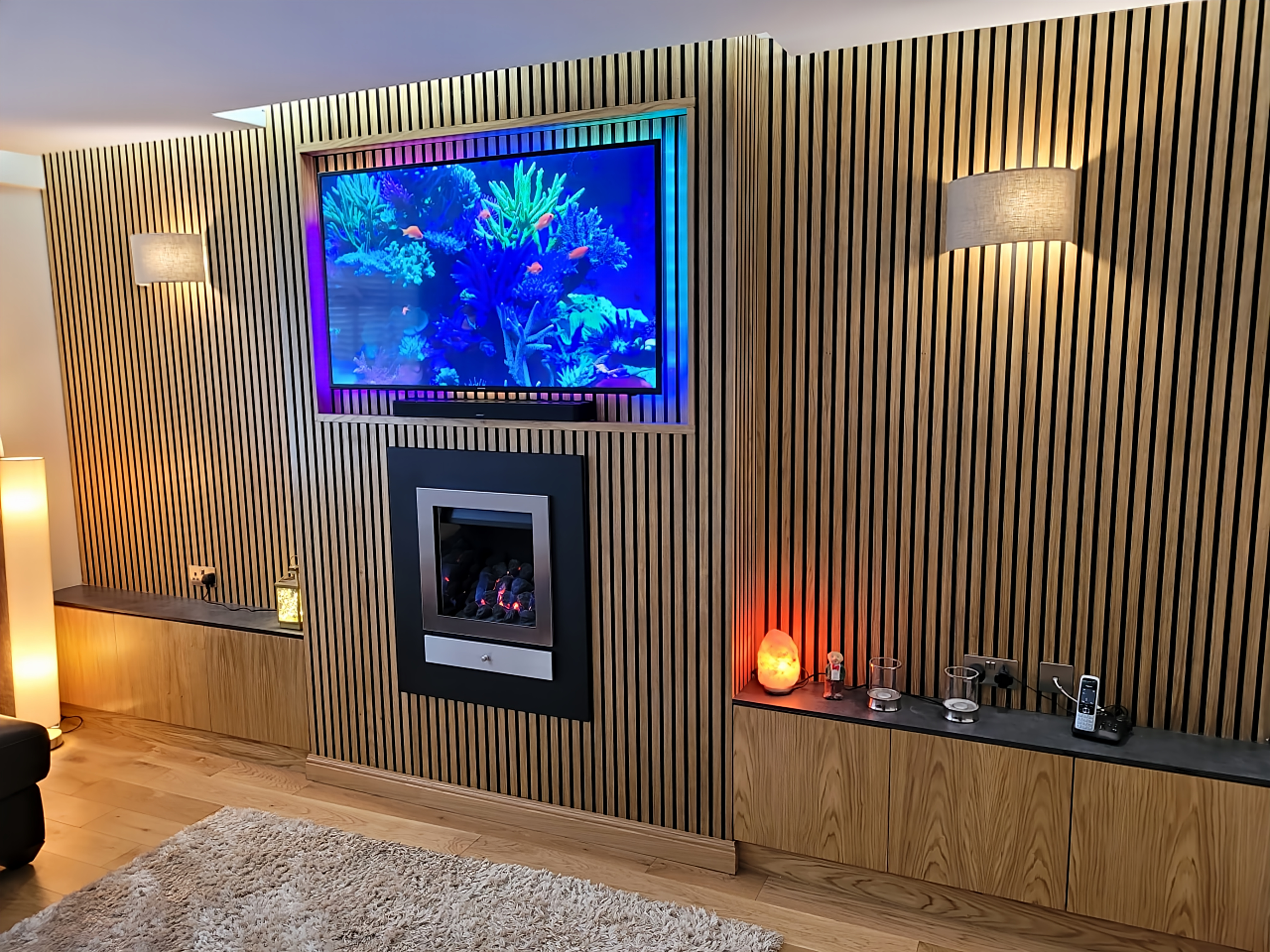 Contemporary media wall with integrated fireplace