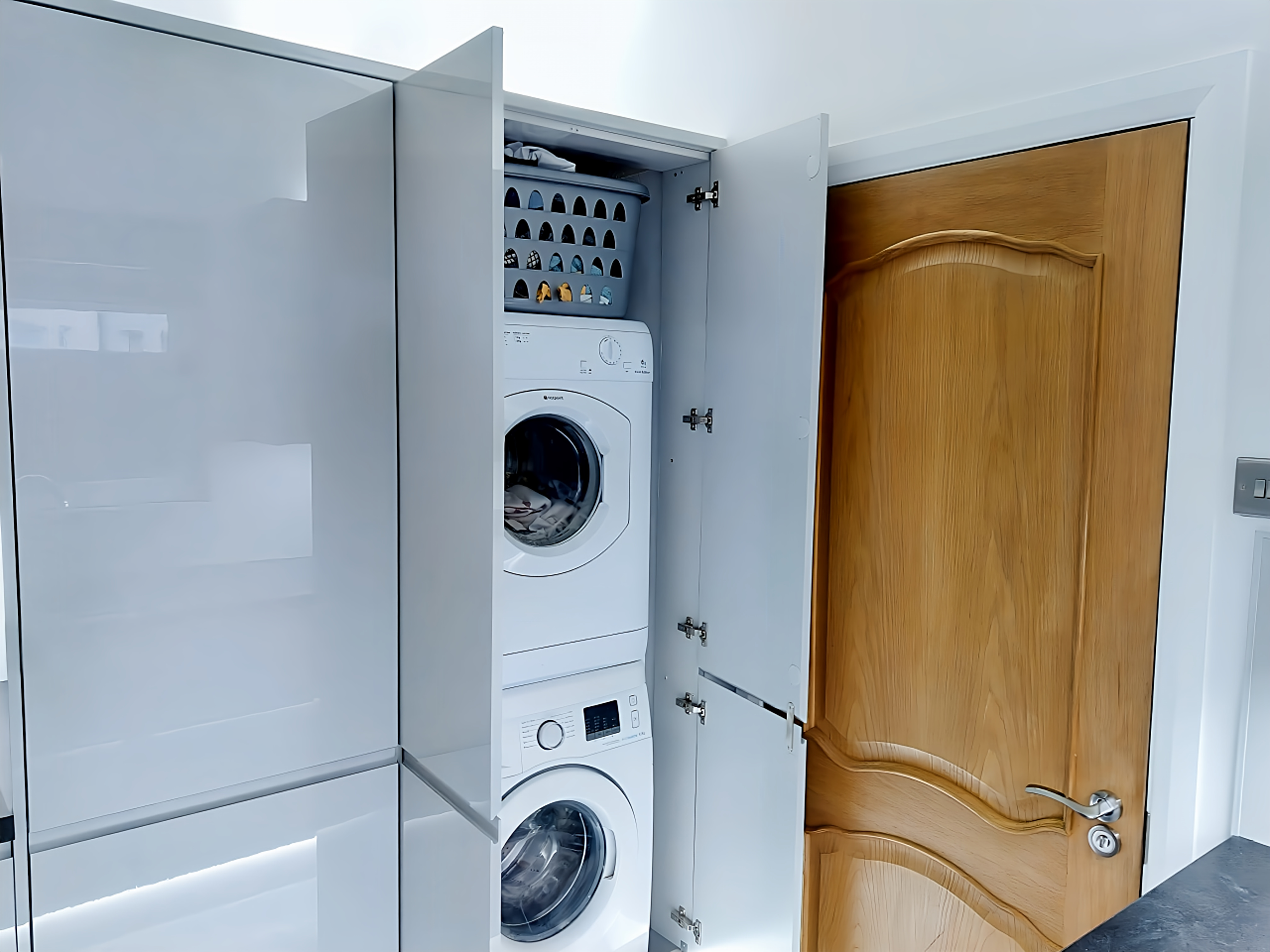 Matching dove grey utility room storage units custom fitted