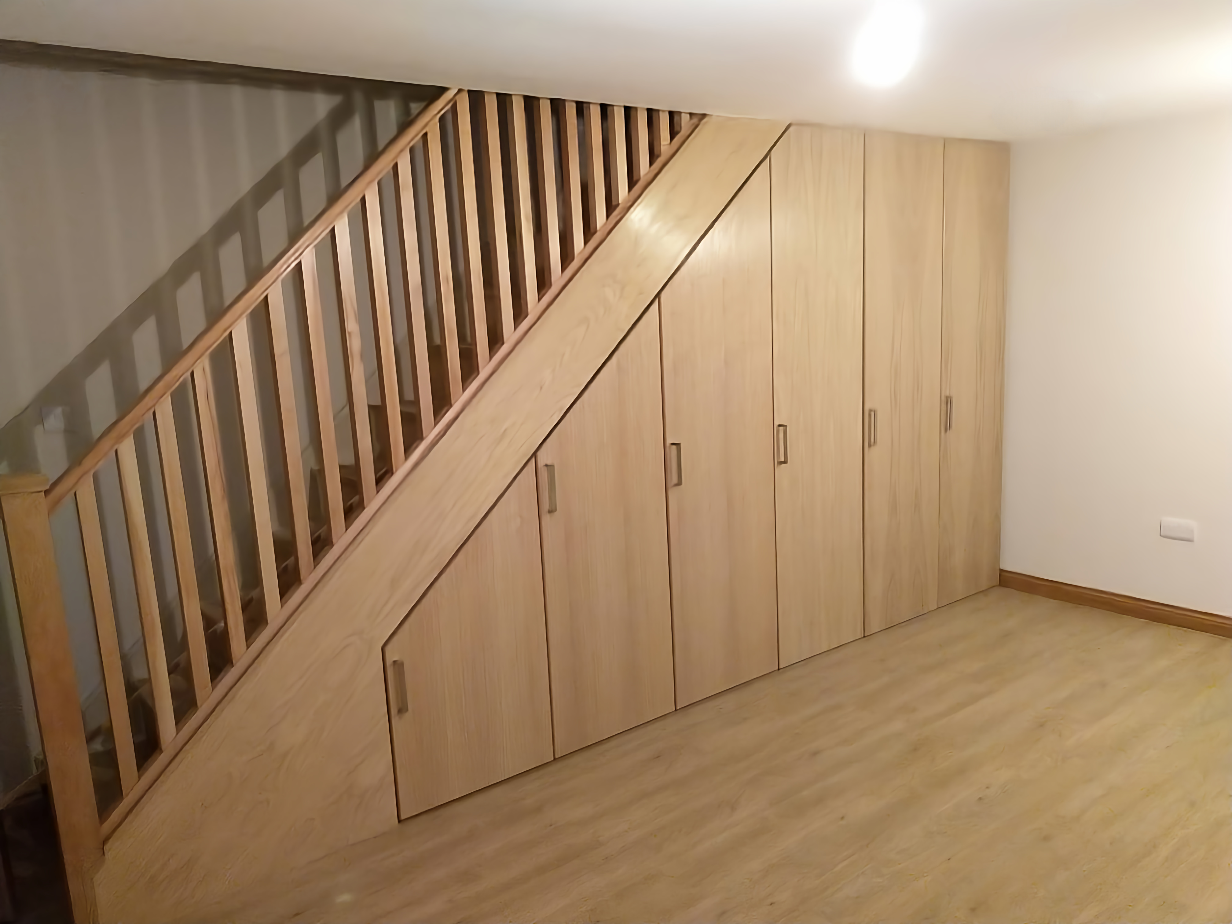 Built in traditional stair cupboard installations