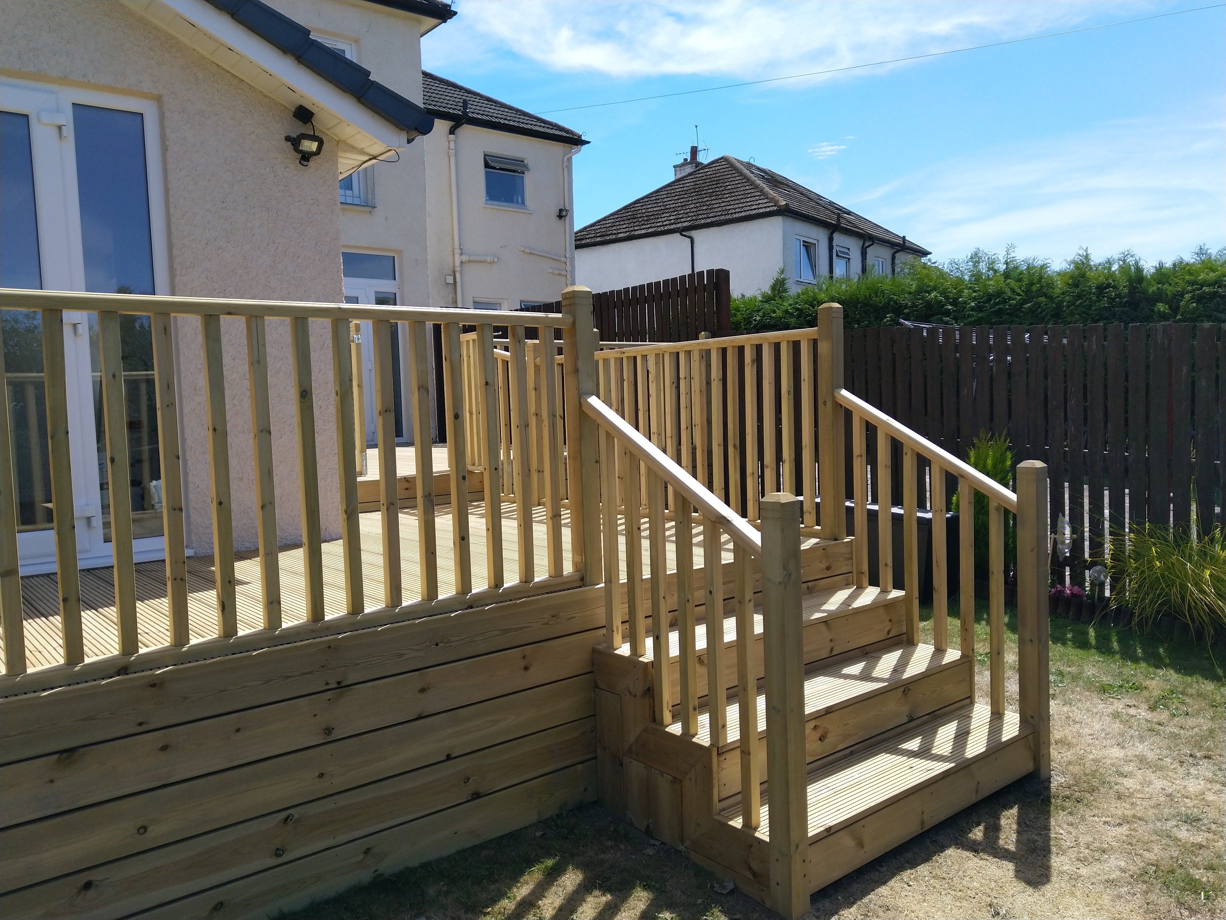 Pressure treated softwood garden decking installed in Glasgow